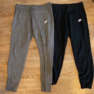 2 pairs of Nike pants